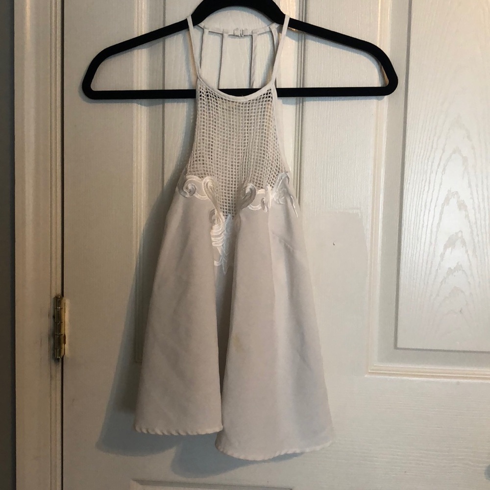 White tank top...size medium but fits like a small